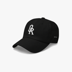 Black classic cap with a white embroidered 'OR' logo on the front, set against a plain light gray background.