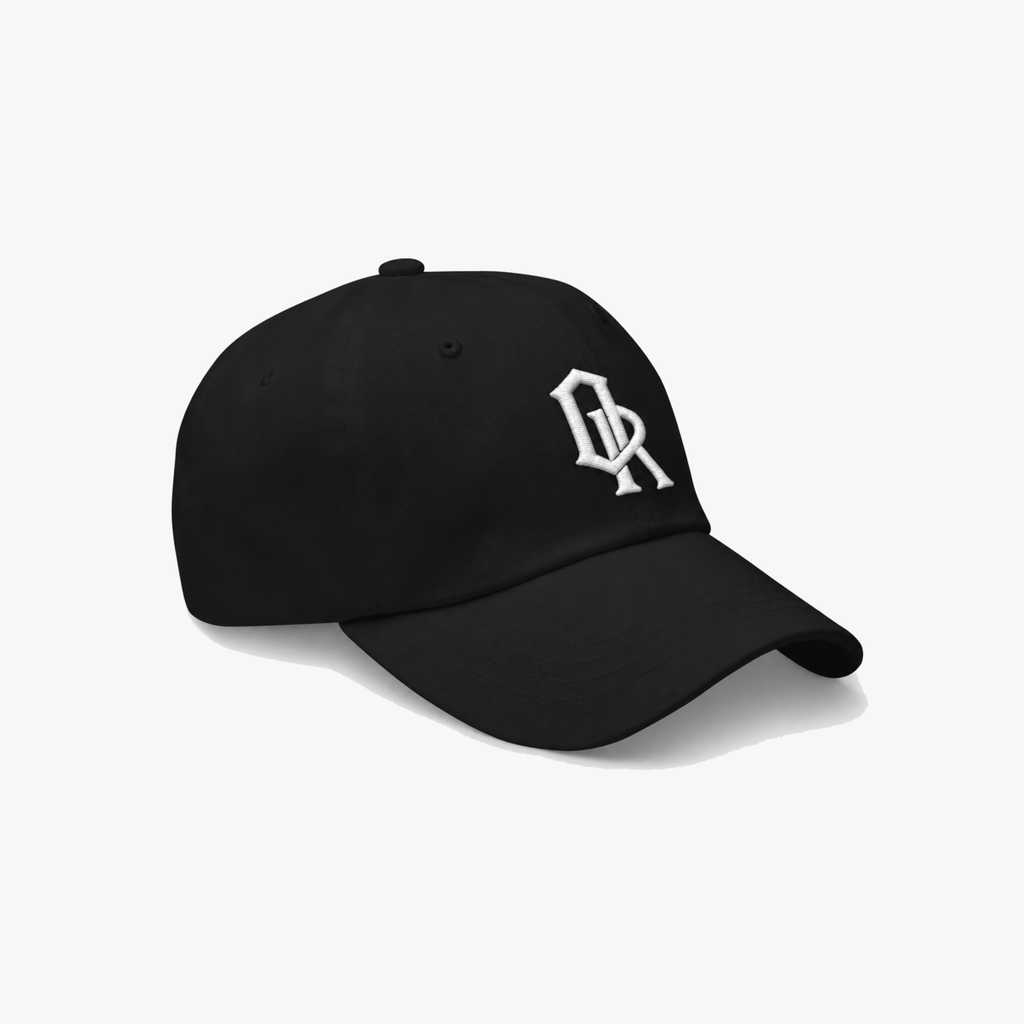 Black classic cap with a white embroidered 'OR' logo on the front, set against a plain light gray background.