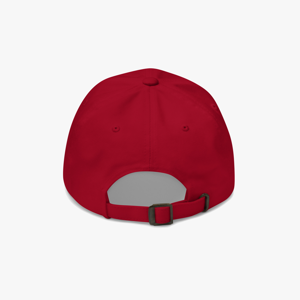 A red baseball cap viewed from the back, featuring an adjustable strap with a black plastic buckle, set against a plain light gray background.