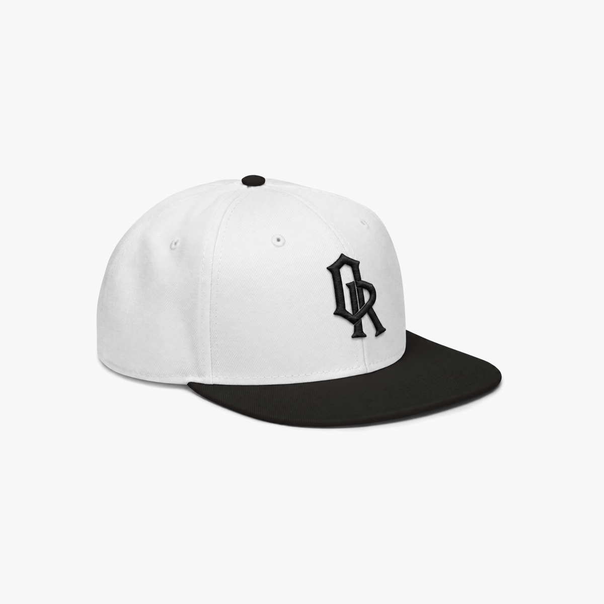 White and black snapback cap with a black embroidered 'OR' logo on the front, set against a plain light gray background.