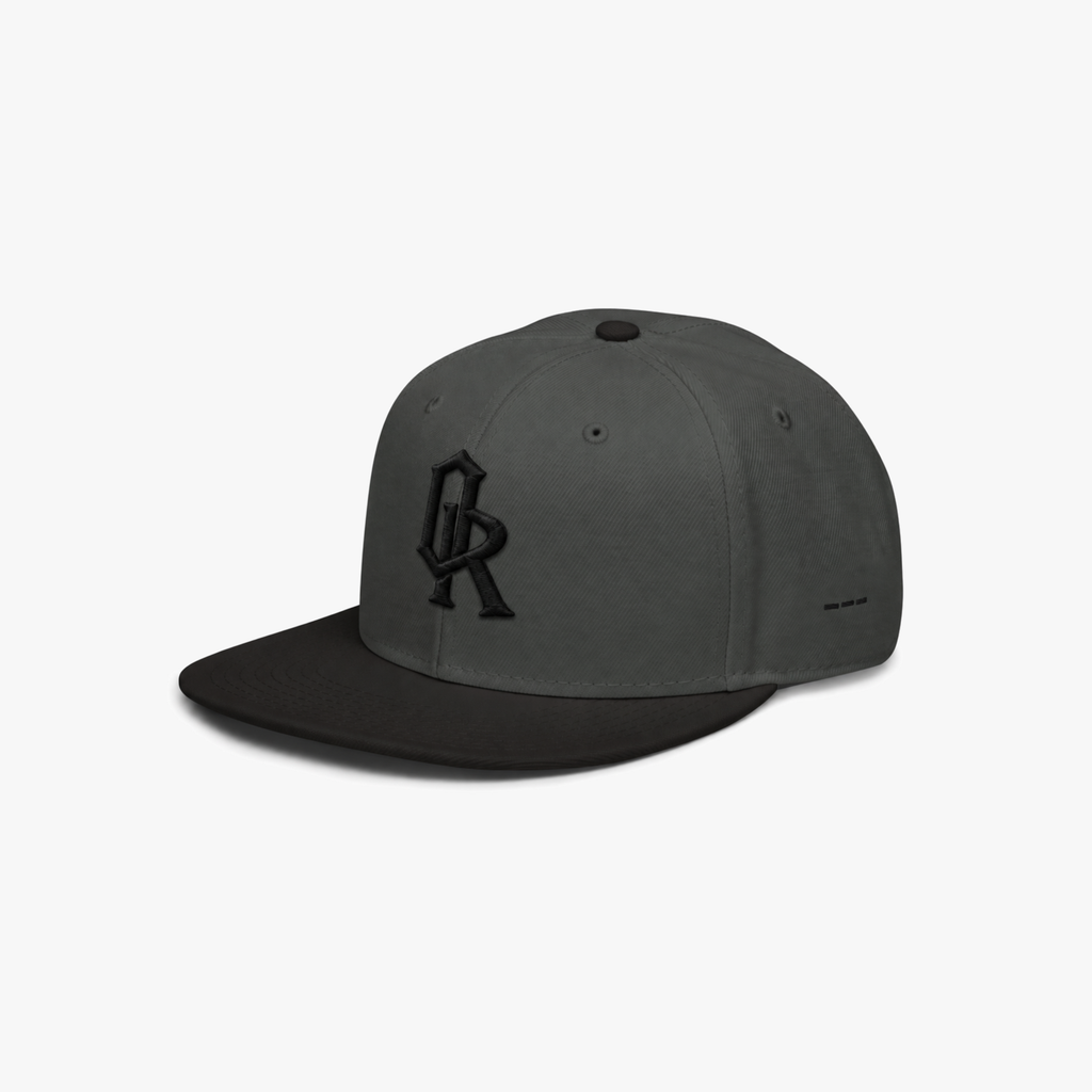 Dark Grey snapback cap with a black embroidered 'OR' logo on the front, set against a plain light gray background.
