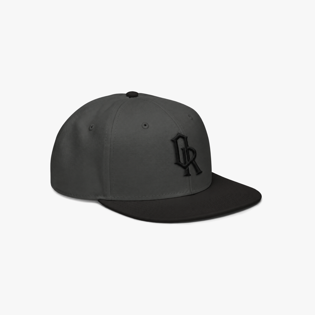 Dark Grey snapback cap with a black embroidered 'OR' logo on the front, set against a plain light gray background.