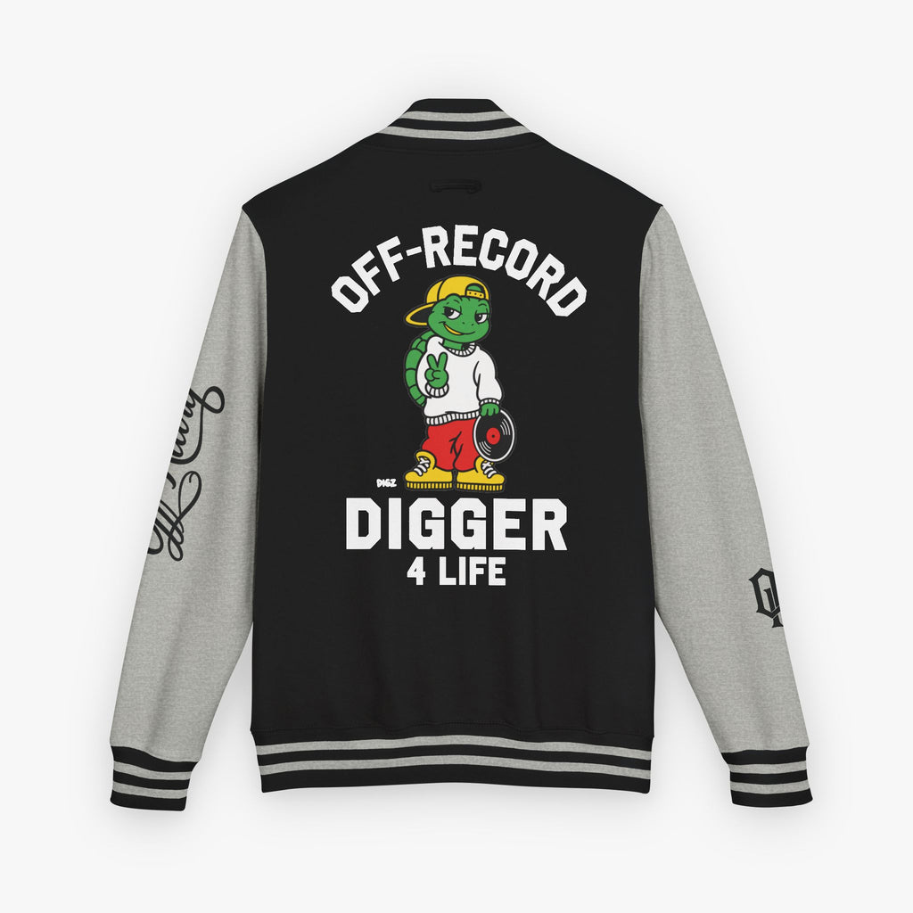 Back view of a varsity-style jacket with a black body and grey sleeves, featuring a large graphic of a green cartoon turtle named 'Digz' wearing a yellow cap and red shorts, with the text 'OFF-RECORD DIGGER 4 LIFE' and script text on the sleeve.
