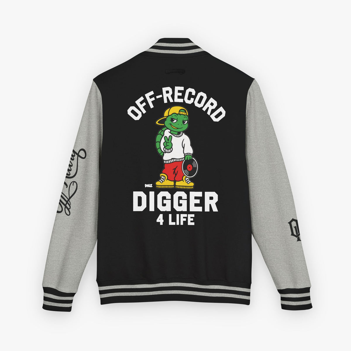 Back view of a varsity-style jacket with a black body and grey sleeves, featuring a large graphic of a green cartoon turtle named 'Digz' wearing a yellow cap and red shorts, with the text 'OFF-RECORD DIGGER 4 LIFE' and script text on the sleeve.