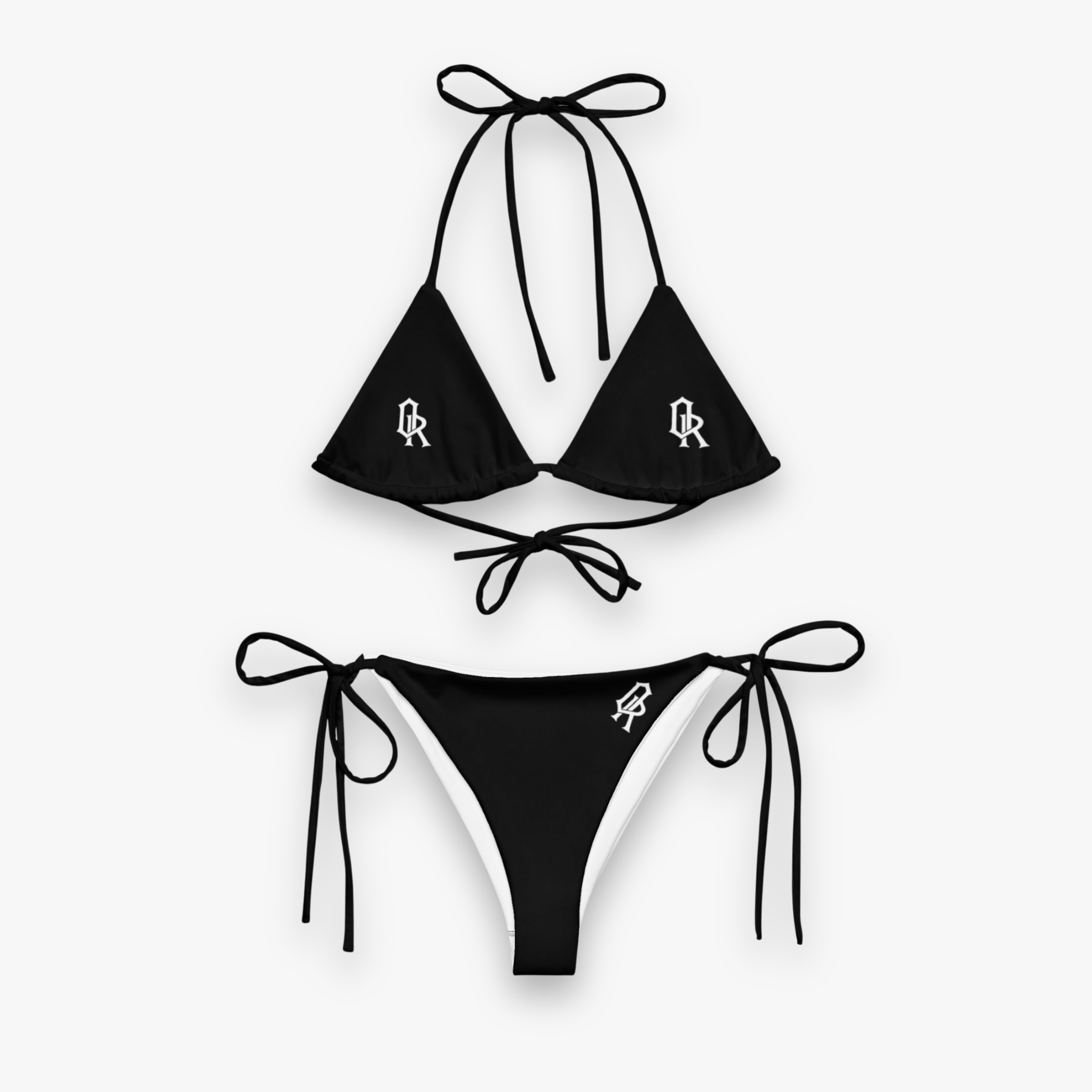 A two-piece black string bikini set with white logo details, displayed flat against a light gray background.