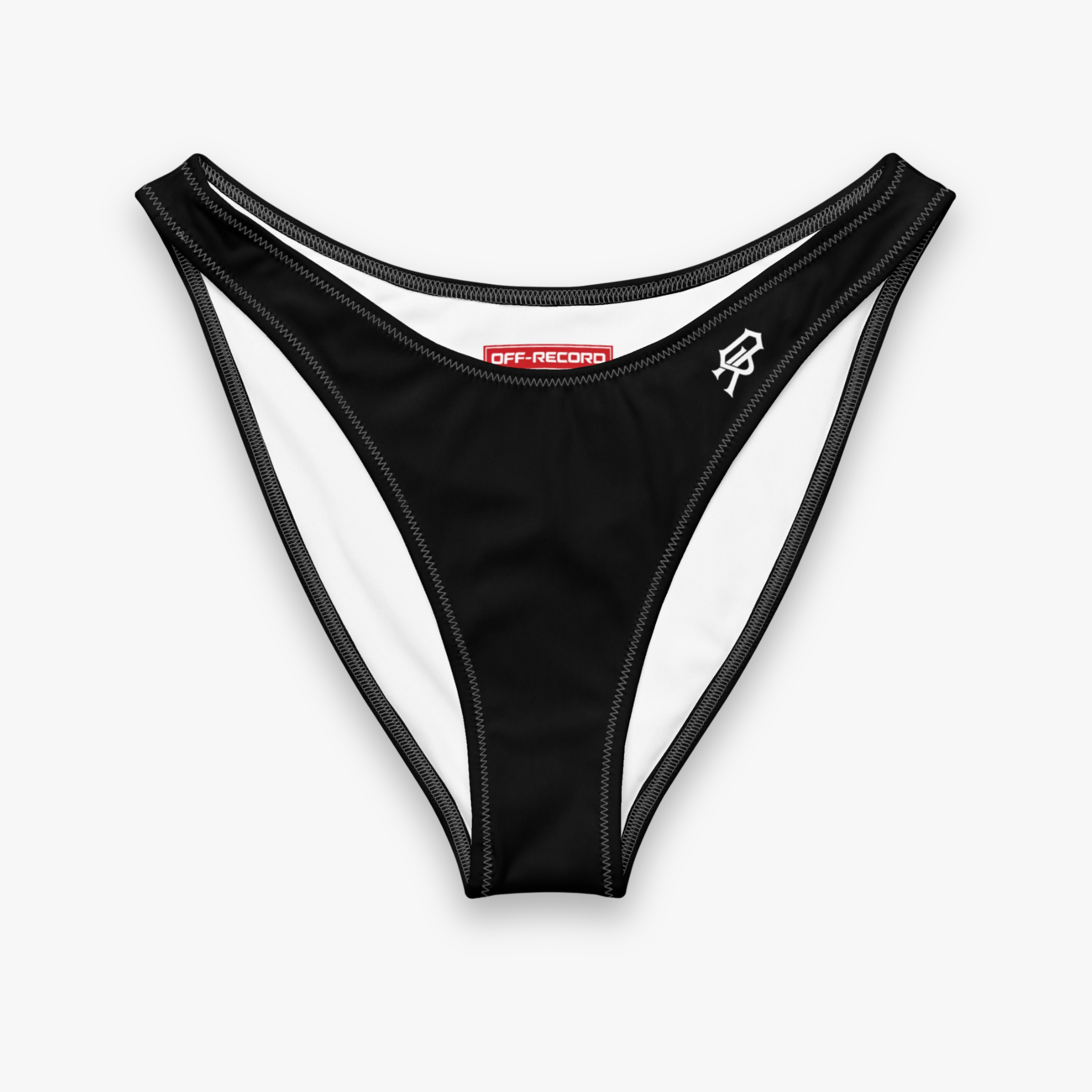 Black low-rise bikini bottom with black trim, featuring a red and white 'OFF-RECORD' label at the center front and a white stylized 'R' logo on the left hip, shown against a light gray background.